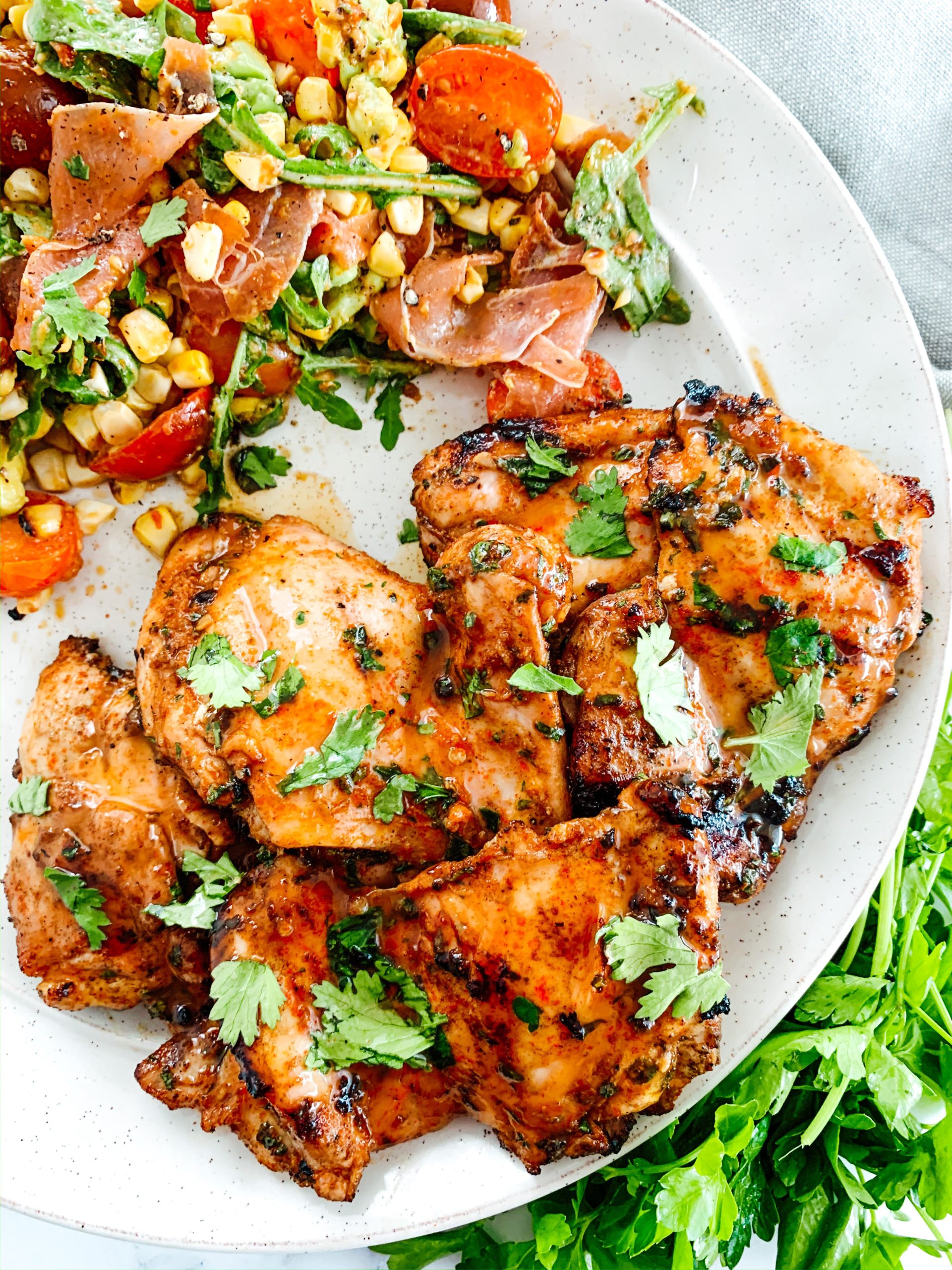 http://thecommunalfeast.com/wp-content/uploads/2020/06/grilled-chicken-thighs-5-scaled.jpg