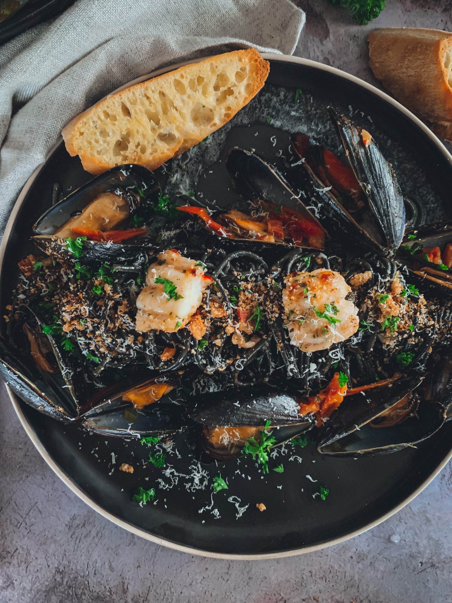 SQUID INK PASTA WITH LOBSTER & MUSSELS IN WHITE WINE - thecommunalfeast.com
